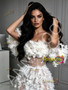 Detailed view off the shoulder 3D tulle flowers on white corseted prom gown