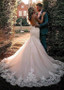 Tulle Spaghetti Straps Backless Beading Mermaid Wedding Dress