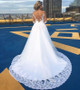 Achieve the next level of elegance in  Lace Appliques Sweep Train Beading Long Sleeve Tulle Wedding Dress