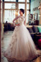 Look and feel beautiful in this 3D Flower Floral Appliques Tulle A-line Long Sleeves Wedding Dress