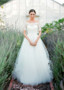 Take Center Stage In A-Line Tulle Bateau Short Sleeve Buttons Lace Wedding Dress