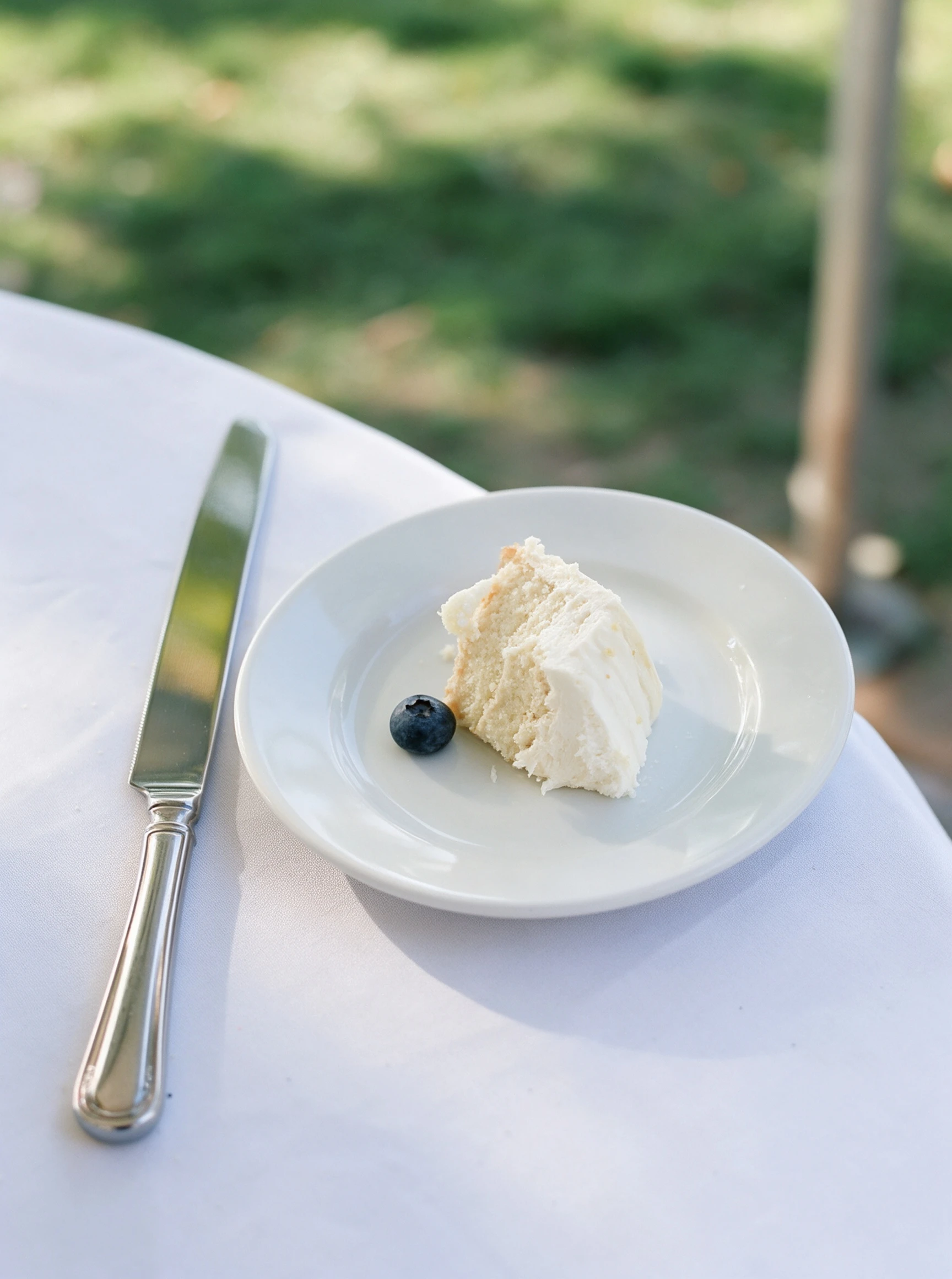 A slice of wedding cake from Lauren's October reception