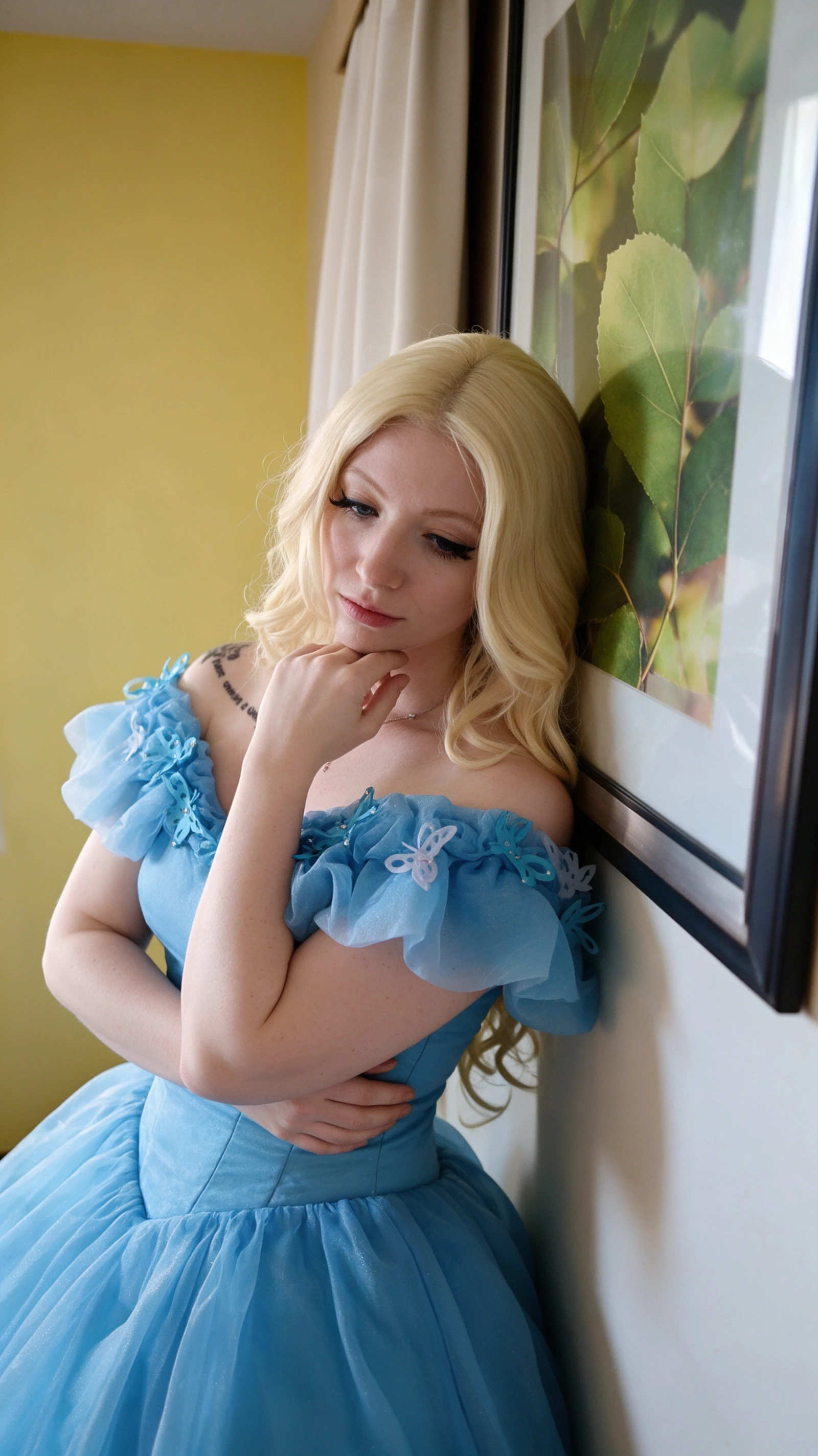 Blue butterfly quinceanera dress neckline closeup