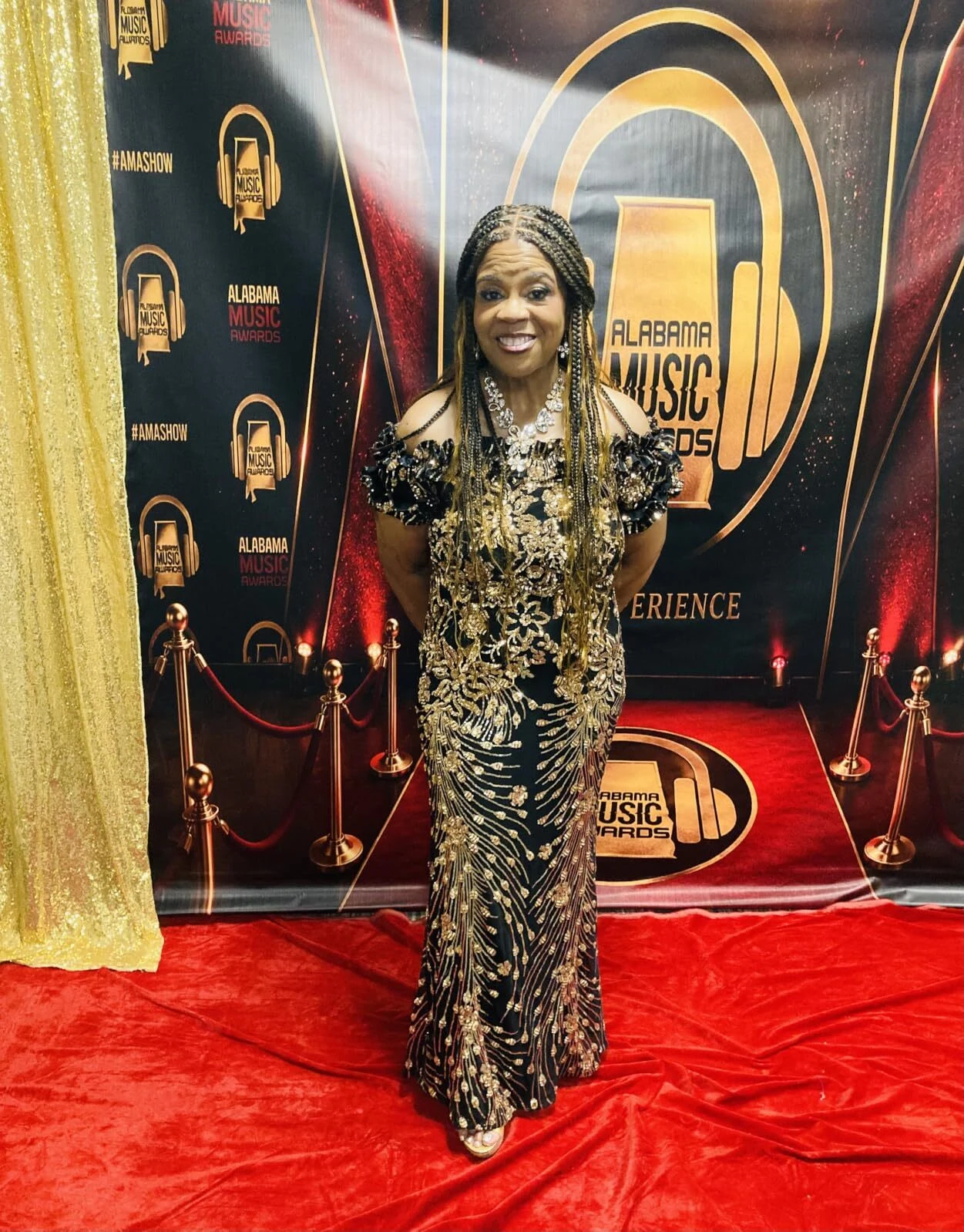 Floor length sequin gown solo red carpet photograph