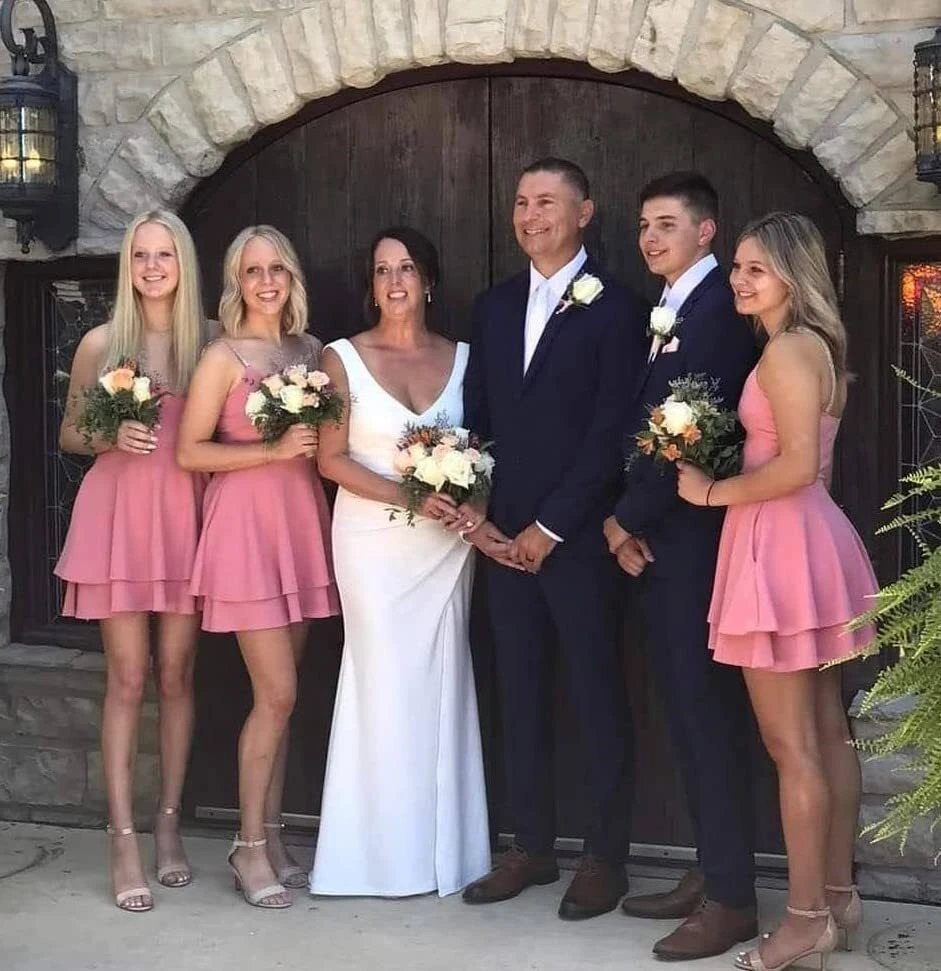 Bride with four blush bridesmaids at a winery wedding