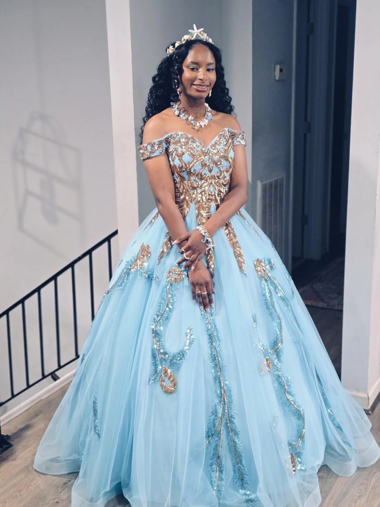 Turquoise prom ball gown with gold sequin bodice and full tulle skirt