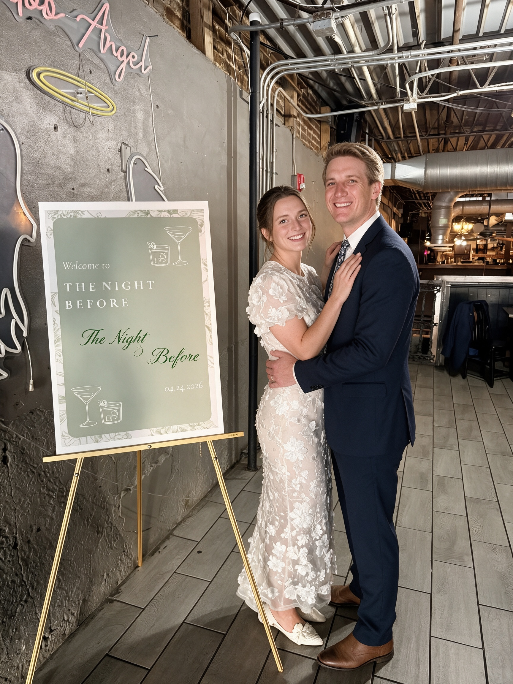 Hugging my fianc&eacute; while wearing a white floral lace midi rehearsal dress