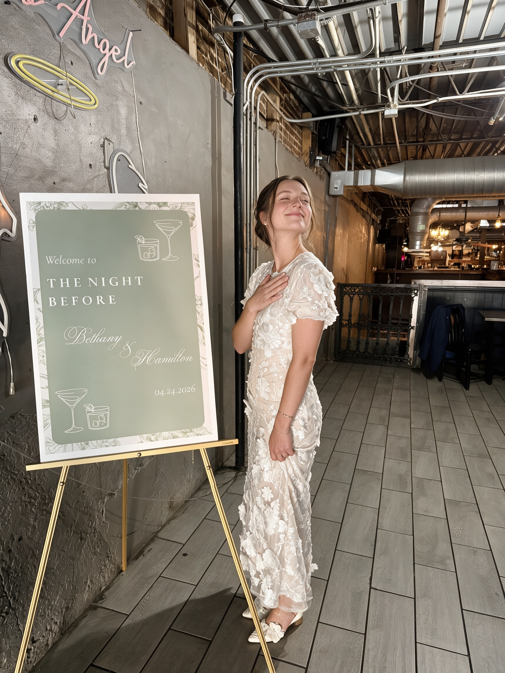 Wearing an embroidered floral lace gown during the wedding weekend