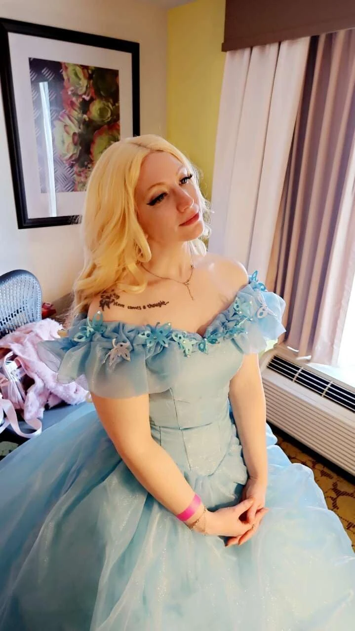 Off shoulder blue ball gown getting ready for Sweet 16