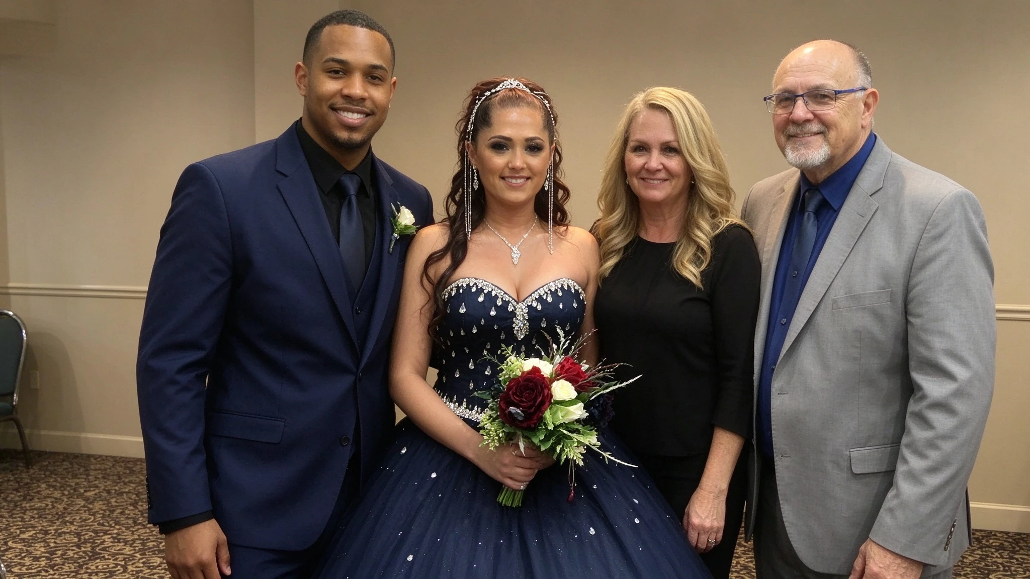 Wedding party portrait in coordinated navy and burgundy colors