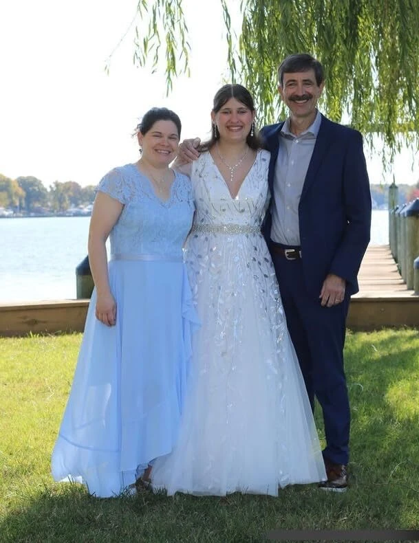 Family photo beside the willows from Lauren's wedding day