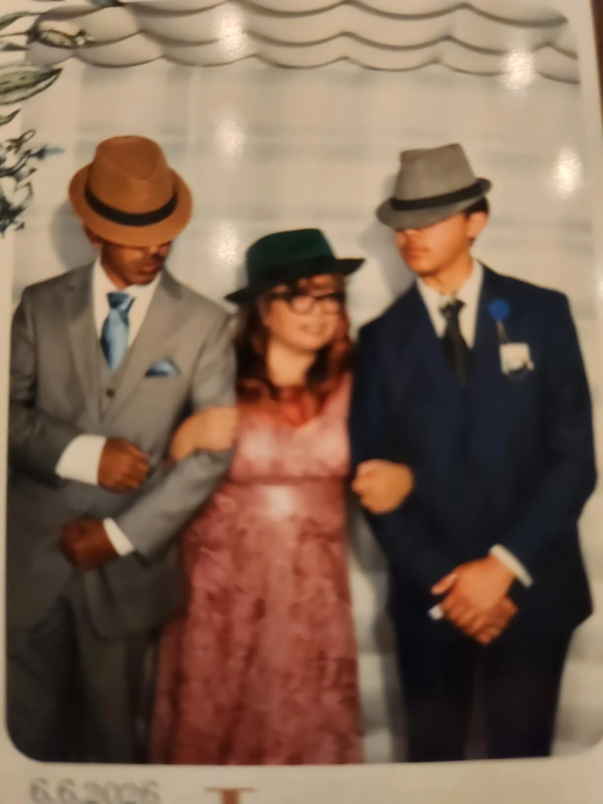Pink wedding guest dress in wedding photo booth