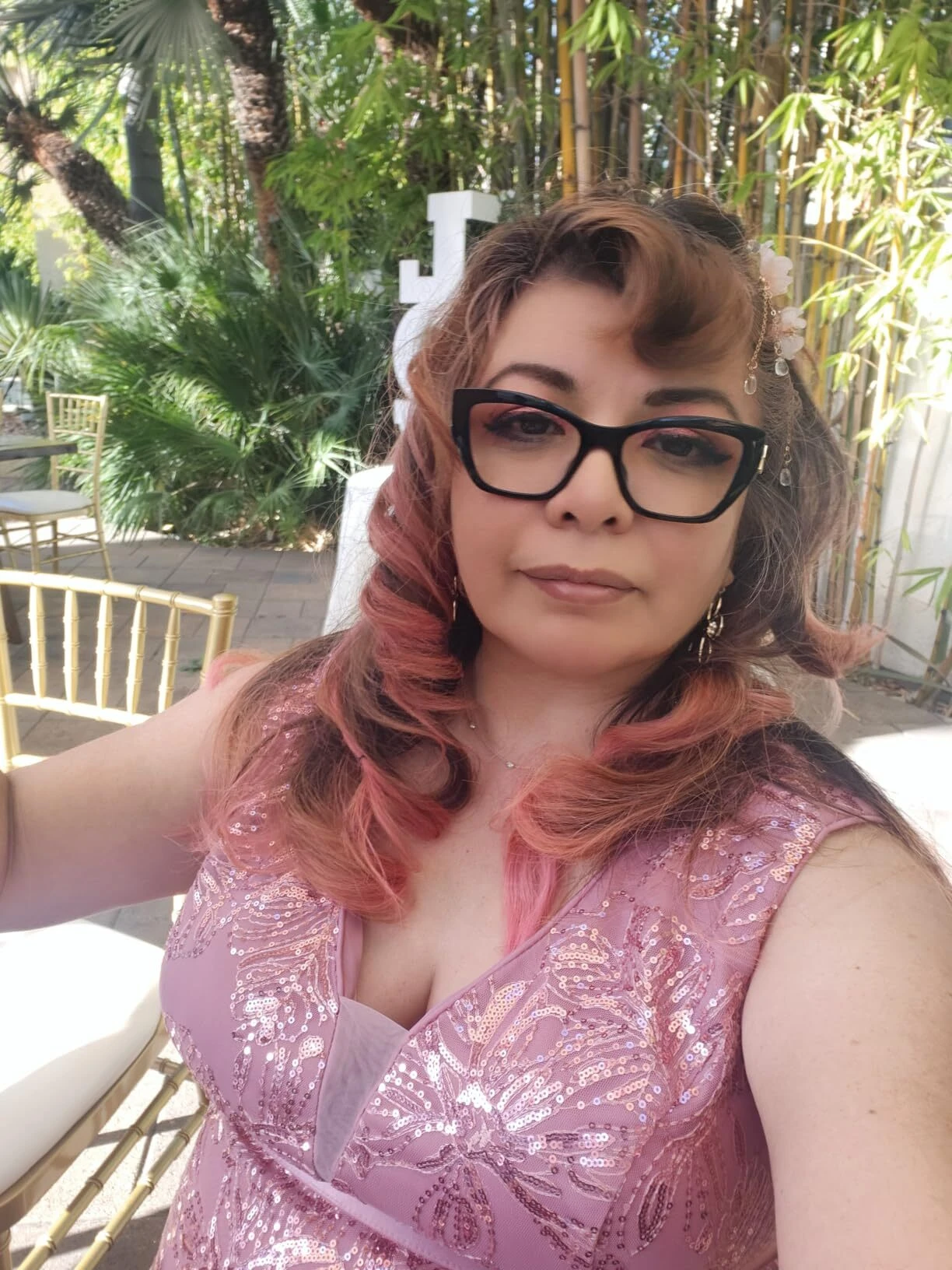 Pink wedding guest dress outdoor selfie