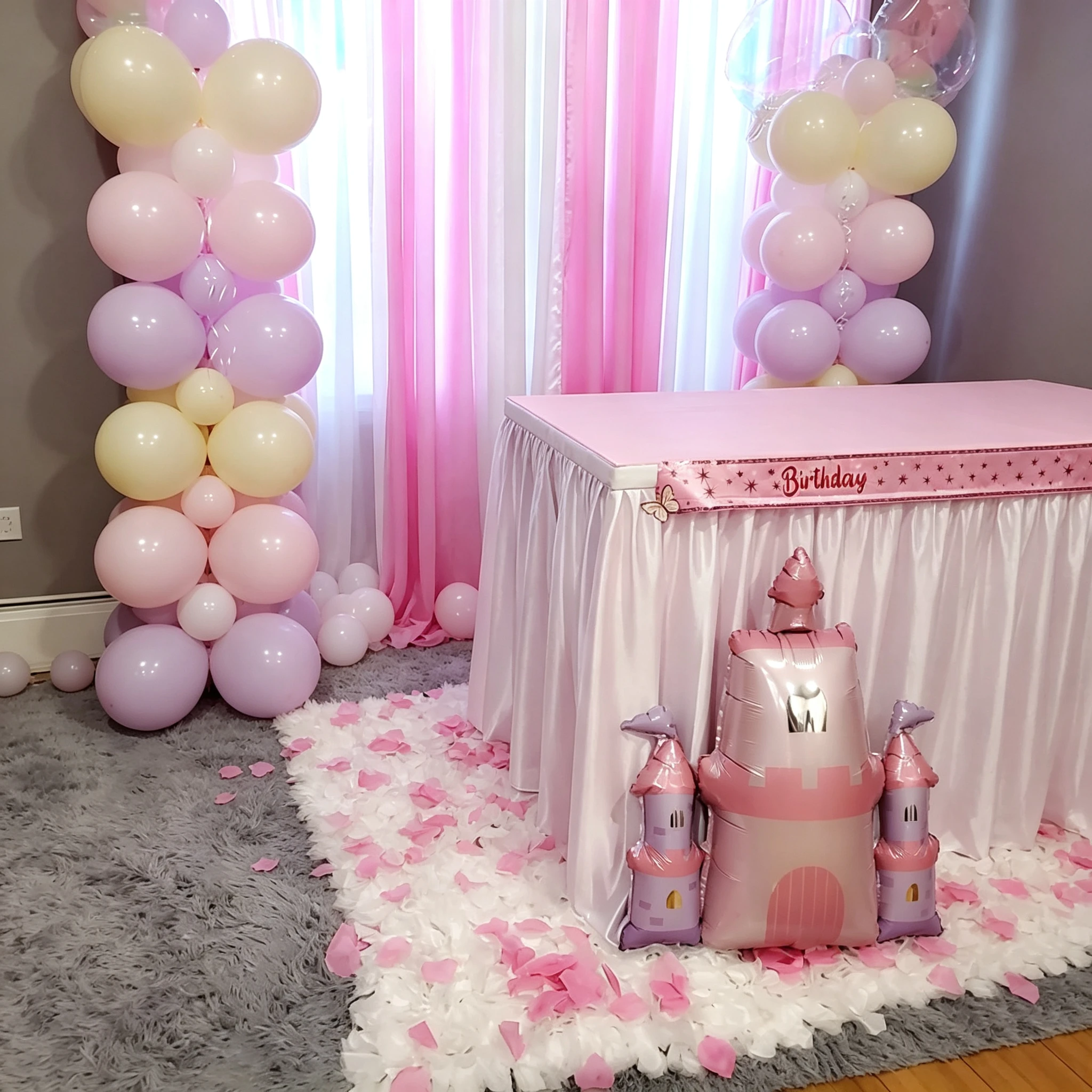 Princess birthday party setting with pastel balloons