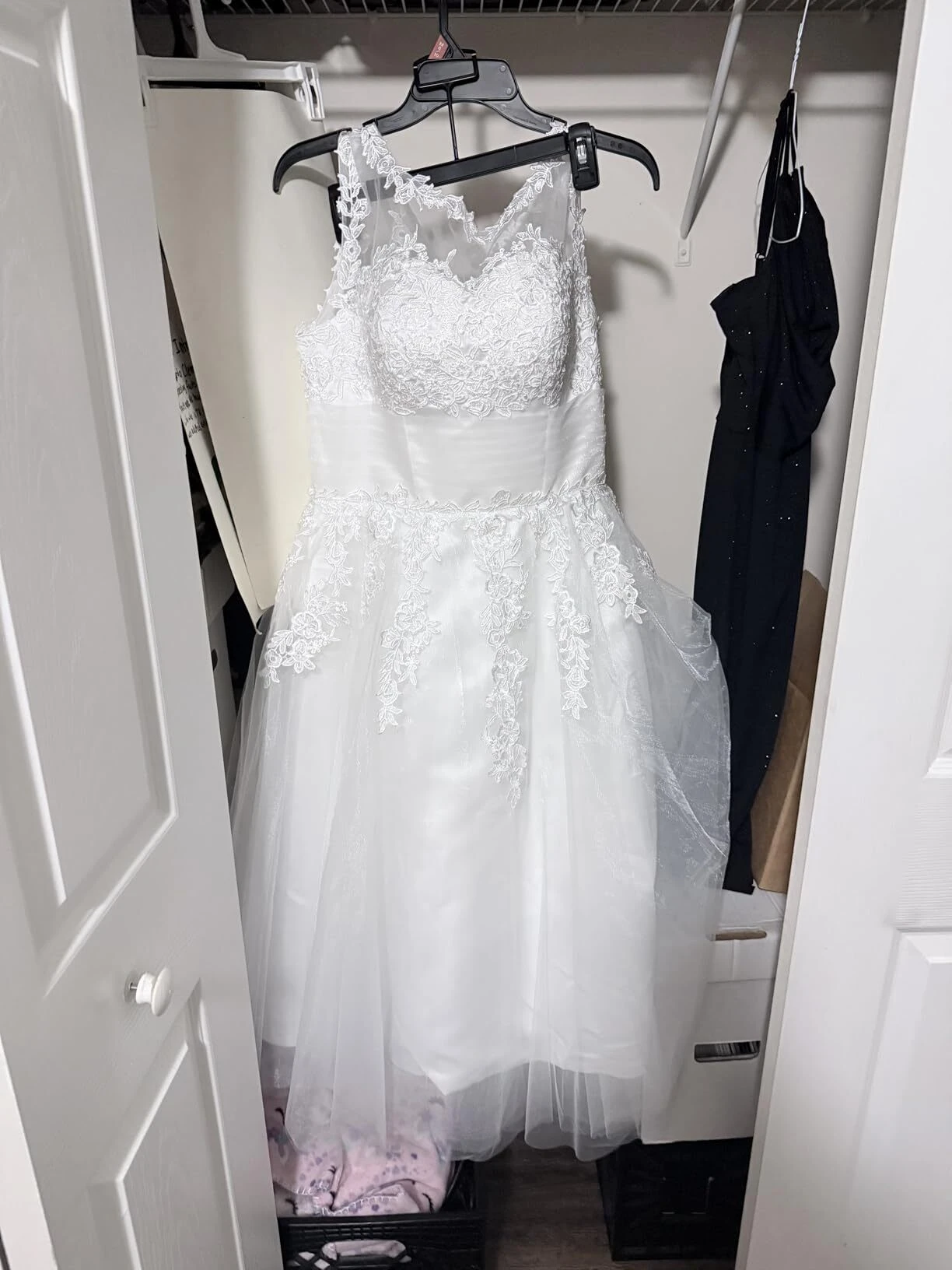Short lace wedding dress before the wedding day