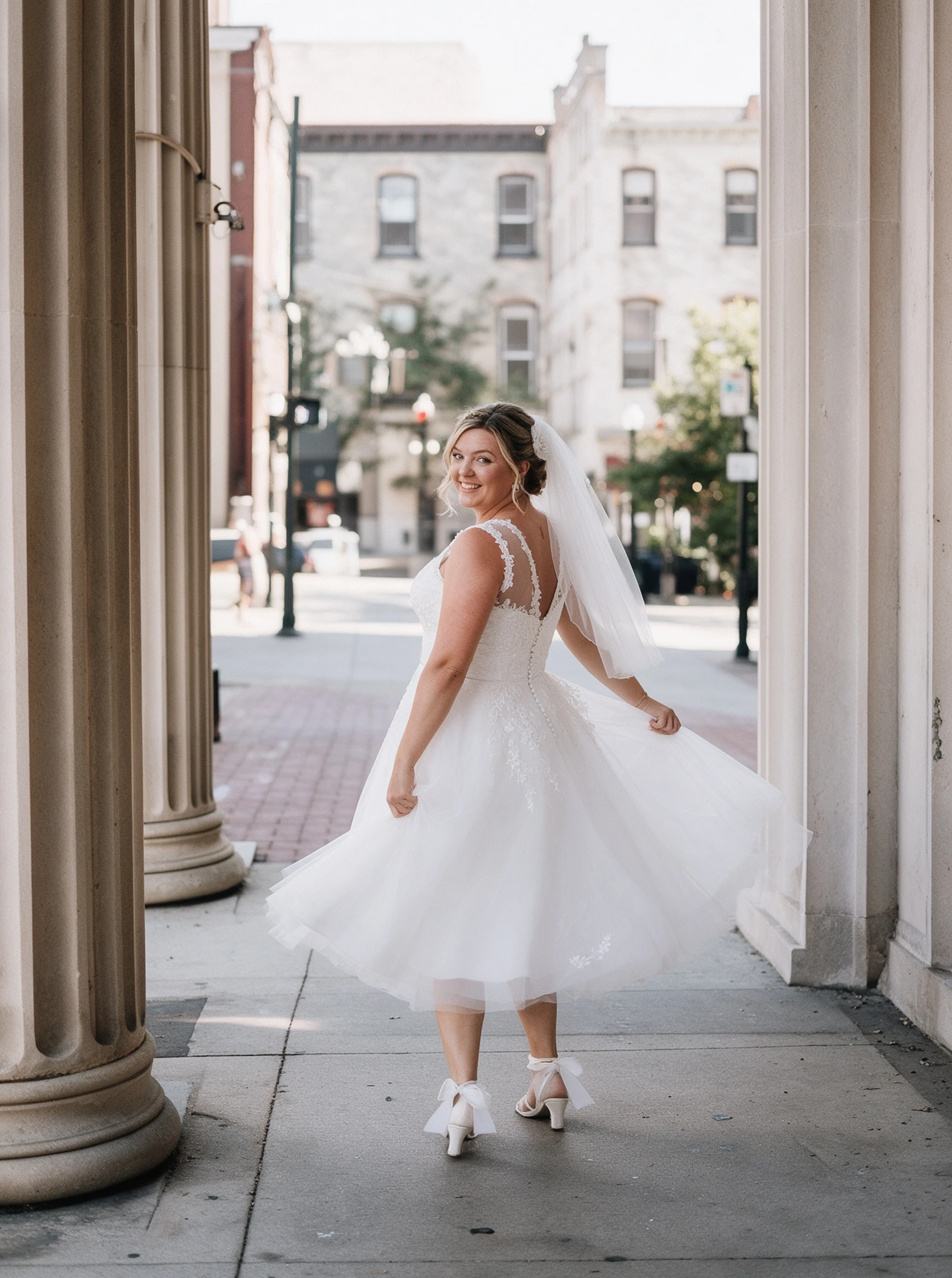 Twirling around in my short lace wedding dress while dancing