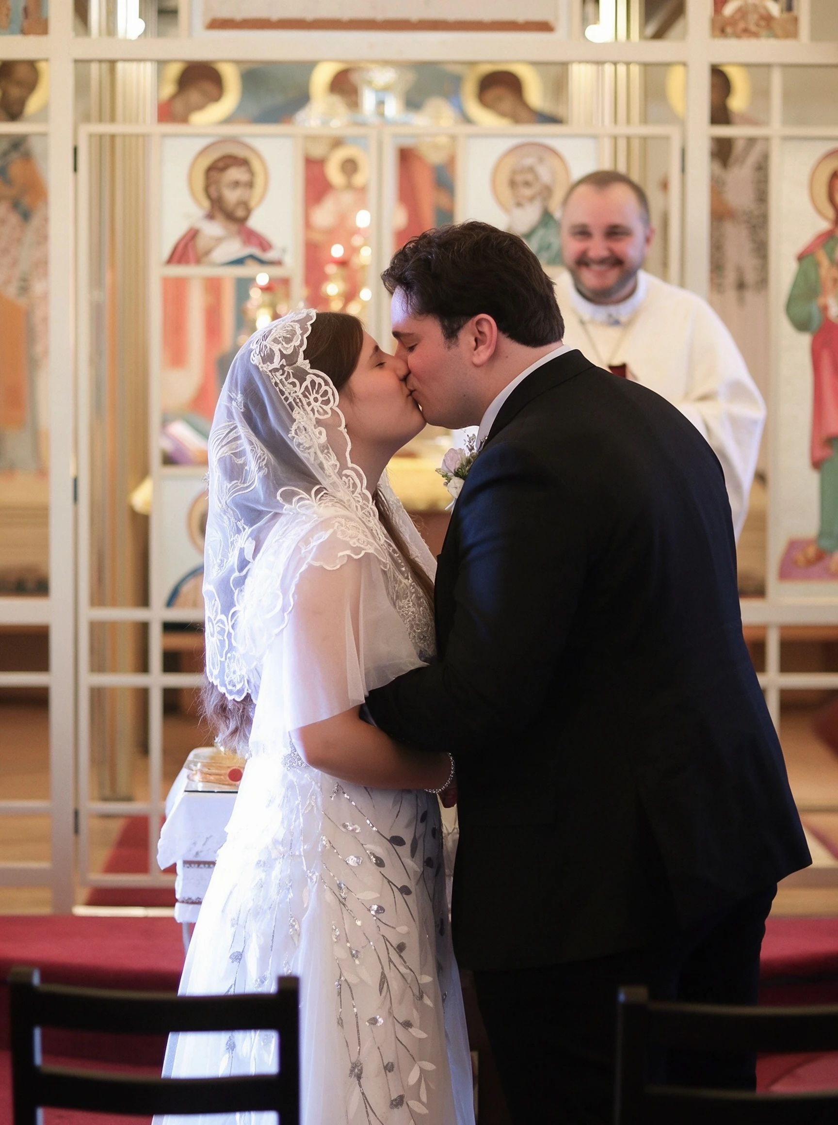 Lauren watching her first kiss with Dan during the wedding ceremony