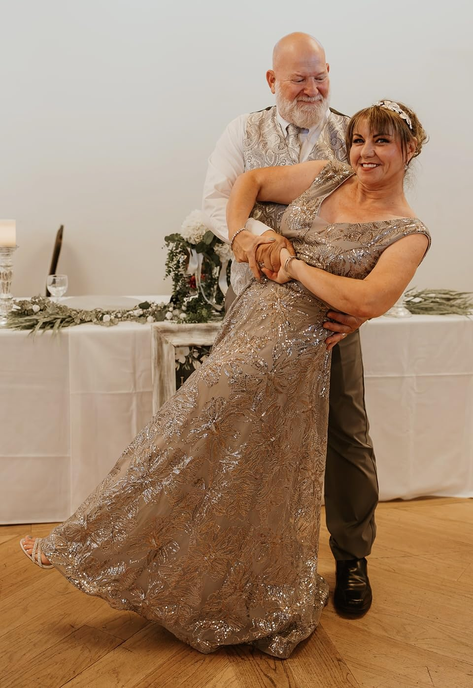 Couple sharing a romantic dance at their vow renewal