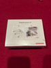Bernina original packaging for magnifying glass