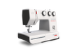 Bernette 35 sewing machine in white with black accents, side angle view showing dials and stitch settings