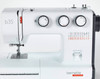 Bernette 35 white sewing machine with red accent, three dials, and included black tote bag, front angle view