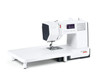 Bernette 38 computerized sewing machine with extension table and black tote bag, white body with LCD display