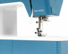 Bernette 05 Academy sewing machine in white and blue with presser foot detail and blue tote bag