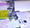 Janome acufeed seam 1/4" foot being used to create a quilt block