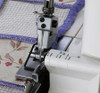 Janome cloth guide setup on a serger guiding the fabric