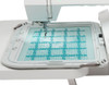 Janome 550e embroidery machine with large RE36b hoop attached and an embroidery project in progress