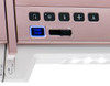 Close-up of the Janome MC9410 QC special function buttons including start/stop, needle up/down, automatic thread cutter, and locking stitch