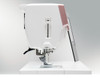 Janome MC9410 QC shown from the right side highlighting the Enhanced Superior Needle Threader and presser foot area