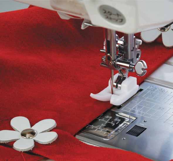 Janome ultra glide foot sewing right over leather, suede, vinyl, or plastic