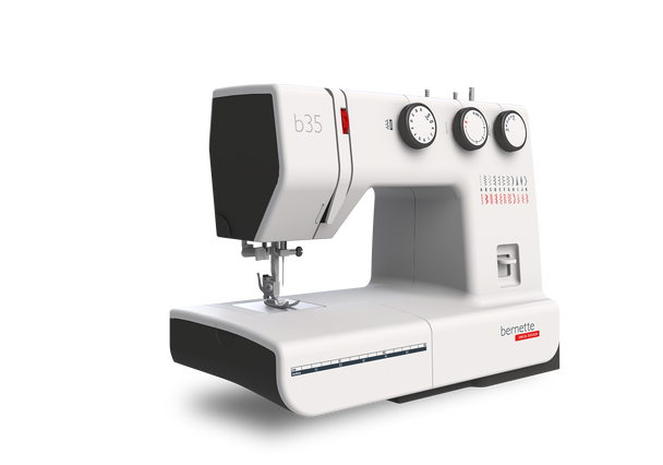 Bernette 35 sewing machine in white with black accents, side angle view showing dials and stitch settings