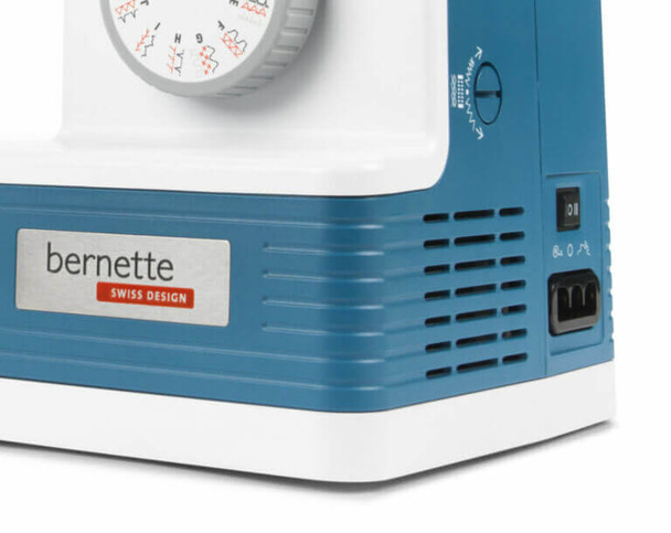 Bernette b05 Academy sewing machine in blue and white, close-up showing control panel and ventilation grille