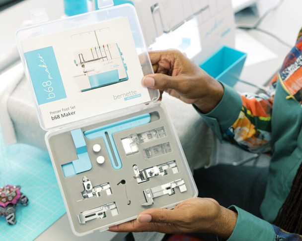 Complete bernette 68 Maker Edition bundle including the sewing machine, premium Mettler thread collection in assorted colors, and durable Tutto trolley for easy transport and storage.