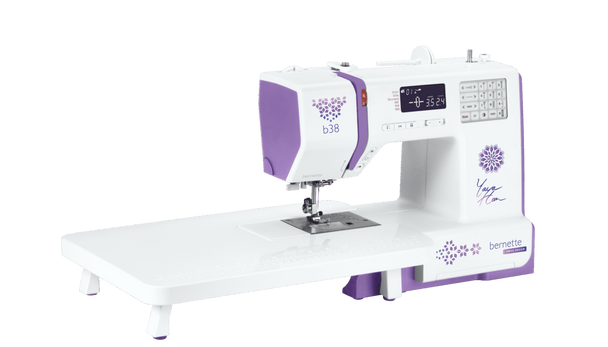 bernette 38 Yaya Han Edition sewing machine with white extension table attached for expanded work surface