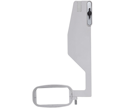 The Janome Free Arm Embroidery Hoop FA10 mounted on a compatible embroidery machine, holding fabric securely in place for stitching. The hoop’s compact, curved design allows easy access to tubular items such as sleeves, cuffs, and pant legs. The fabric is stretched smoothly within the hoop, demonstrating precise positioning for detailed embroidery work.