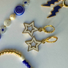 UConn Spirit Earring Stack in navy and white, Huskies huggie hoop earrings (view 5)