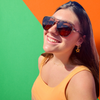 Wearing the University of Miami Spirit Earring Stack for Hurricanes game day