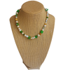 Green Lucky Charm Pearl Necklace  on stand  Background Removed