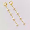 Pearl drop earrings with Huggie hoops in gold