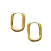 Gold filled Statement rectangle hoops background removed lying flat