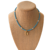 cool, glacier bright blue seed beaded choker on stand background removed
