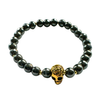 round hematite gemstone bracelet with gold plated skull charm