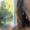 Wearing Glitzy Safety Pin Earrings with White Accent