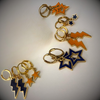 Mercer Spirit Earring Stack with orange mini enamel bolts and black starboys