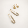 Dolly Stack earring set with rhinestone safety pins and butterfly huggie hoops