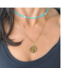 wearing lucky necklace