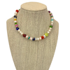 let the good times roll y2k pearl and charm necklace on stand